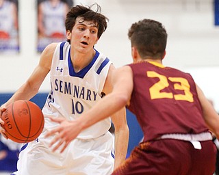 Poland's Daniel Kramer tries to get the ball past South Range's Jaxon Anderson during their game at Poland on Tuesday night. EMILY MATTHEWS | THE VINDICATOR