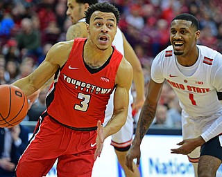 COLUMBUS, OHIO - DECEMBER 18, 2018: Youngstown State's Darius Quisenberry drives on Ohio State's Mother Muhammad during the first half of their game, Tuesday night at the Schottenstein Center. Ohio State won 75-56. DAVID DERMER | THE VINDICATOR