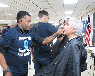 Neighbors | Jessica Harker .Excalibur Barbers in Warren traveled to Austintown High School where they shaved 27 men including cancer survivor Phil Pillin to raise awareness for prostate cancer in the Mahoning Valley.