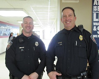 Neighbors | Jessica Harker .School resource officers at Austintown Fitch High School participated in the school's first Shave Off event to raise awareness for prostate cancer in the Valley.