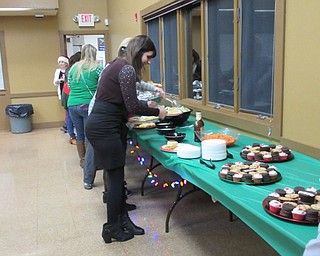 Neighbors | Jessica Harker.A table of food and treats made by Karen McCallum, the Recreation Director at Boardman Park, was available to community members at the event on Dec. 6.