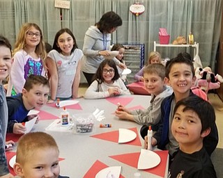 Neighbors | Submitted .Poland Students along with Phyllis Jeswald, second grade teacher, used arts and crafts to create Santa's that they gave to local nursing homes.