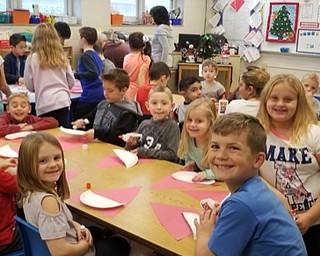 Neighbors | Submitted .Students at Poland Union Elementary used paper plates, paper and glue to create crafts for residents in local nursing homes.