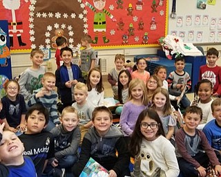 Neighbors | Submitted .Poland Union students from Joy Bucci's preschool class and Phyllis Jeswald's second-grade class gathered together to create Santa Claus crafts for local nursing homes.