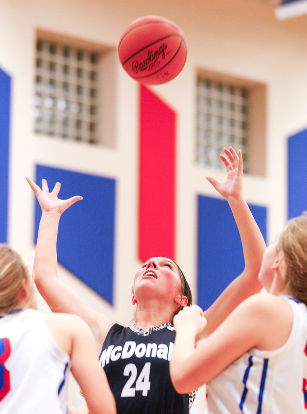 McDonald's Brooke Lewis catches a rebound against Western Reserve during their game at Western Reserve on Thursday night. EMILY MATTHEWS | THE VINDICATOR