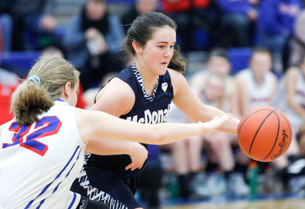 McDonald's Taylor Tuchek dribbles the ball while Western Reserve's Alyssa Serensky tries to block her during their game at Western Reserve on Thursday night. EMILY MATTHEWS | THE VINDICATOR