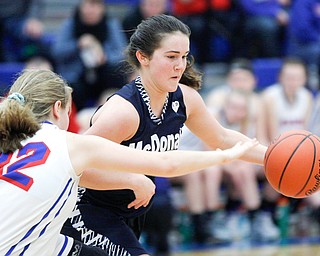 McDonald's Taylor Tuchek dribbles the ball while Western Reserve's Alyssa Serensky tries to block her during their game at Western Reserve on Thursday night. EMILY MATTHEWS | THE VINDICATOR