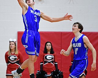 GIRARD, OHIO - DECEMBER 21, 2018: Poland's Braeden O'Shaughnessy leaps to intercept a Girard pass during the second half of their game, Friday night at Girard High School. DAVID DERMER | THE VINDICATOR..Poland's Daniel Kramer pictured.