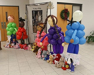      ROBERT  K. YOSAY | THE VINDICATOR.. Services for the five children killed Dec. 9 in a fire at their Parkcliffe Avenue home were held at New Bethel Baptist Church...Memorials and stuffed bears were in the lobby of the church