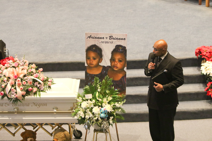      ROBERT  K. YOSAY | THE VINDICATOR.. Services for the five children killed Dec. 9 in a fire at their Parkcliffe Avenue home were held at New Bethel Baptist Church...Rev Ken Simon Pastor New Bethel Baptist church opens the funeral service