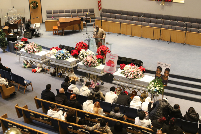      ROBERT  K. YOSAY | THE VINDICATOR.. Services for the five children killed Dec. 9 in a fire at their Parkcliffe Avenue home were held at New Bethel Baptist Church...Rev Louis Macklin  officiated over the first part of the service