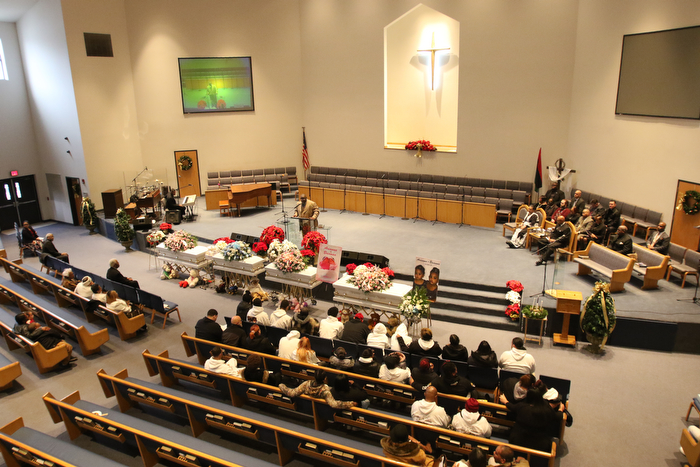      ROBERT  K. YOSAY | THE VINDICATOR.. Services for the five children killed Dec. 9 in a fire at their Parkcliffe Avenue home were held at New Bethel Baptist Church...Rev Louis Macklin  officiated over the first part of the service