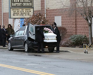      ROBERT  K. YOSAY | THE VINDICATOR.. Services for the five children killed Dec. 9 in a fire at their Parkcliffe Avenue home were held at New Bethel Baptist Church...The last of the caskets is placed in the waiting hearse