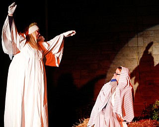 The angel Gabriel, portrayed by Janelle Nagy, visits Mary, portrayed by Rachael Lanham, during the Live Nativity at Zion Lutheran Church in Cornersburg on Sunday evening. EMILY MATTHEWS | THE VINDICATOR