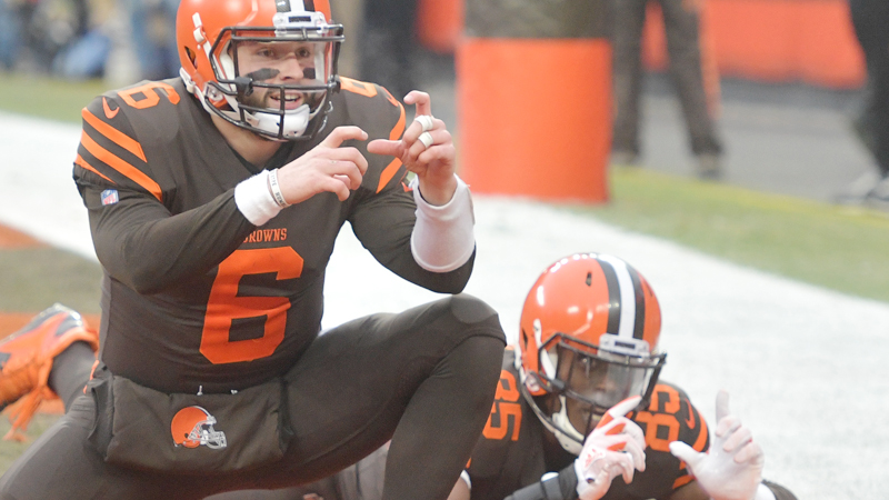 Browns quarterback Baker Mayfield (6) and tight end David Njoku celebrate a touchdown Sunday against the Cincinnati Bengals in Cleveland. The Browns turnaround season is one of the NFL's top stories this year.