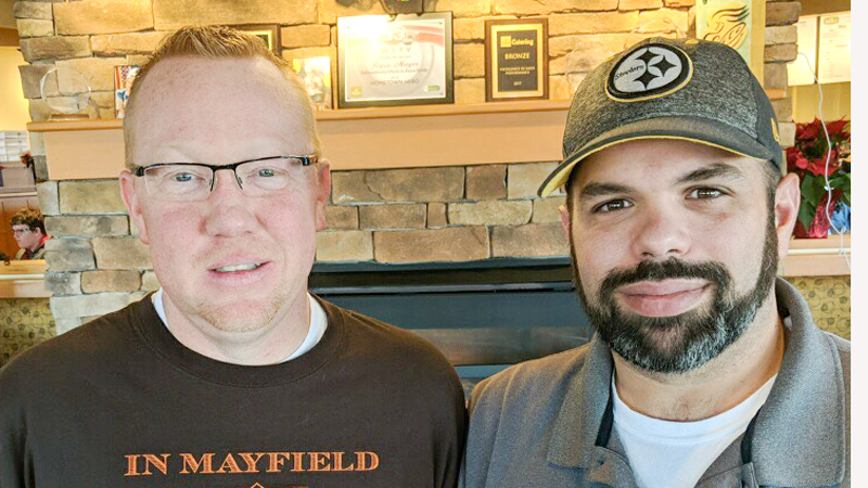 Former Oak Tree Country Club golf pro Kevin Vanoverbeke, left, stands with his longtime friend Chris Amadei. This week at the Cleveland Clinic both will undergo surgery as Vanoverbeke will receive a kidney, while Amadei is donating one of his.