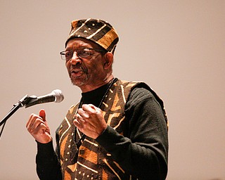 Ron Daniels, who held the first Kwanzaa celebration in Youngstown 50 years ago, speaks during a Kwanzaa celebration at New Bethel Baptist Church on Wednesday night. EMILY MATTHEWS | THE VINDICATOR