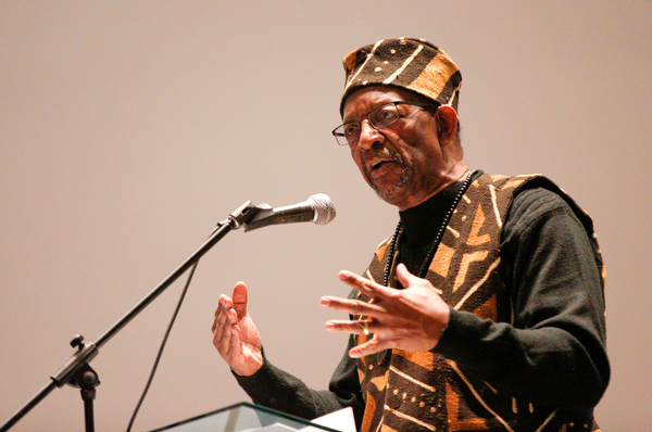 Ron Daniels, who held the first Kwanzaa celebration in Youngstown 50 years ago, speaks during a Kwanzaa celebration at New Bethel Baptist Church on Wednesday night. EMILY MATTHEWS | THE VINDICATOR