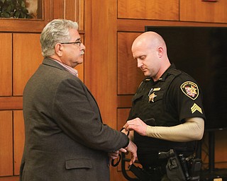  ROBERT K.YOSAY  | THE VINDICATOR..And with a click former mayor ralph infant is taken into custody --- The jury in the Ralph Infante corruption trial have found the former Niles mayor guilty of 22 of the 32 charges he faced, including the most serious charge, engaging in a pattern of corrupt activity...Infante, 62, did not appear to show any reaction to the verdicts. Sentencing is set for 10 a.m. Friday.....-30-