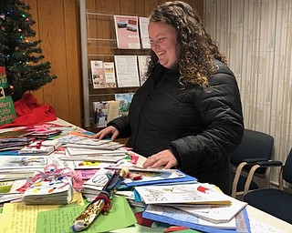 Neighbors | Submitted.Youngstown State University student Morgan Brandt picked up a box full of cards and letters from Boardman. She will deliver them to the Blue Star Mothers of America to get to soldiers in time for the holidays.