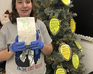 Neighbors | Submitted.Kindness Club members used funds from their usual popcorn sales to raise money to buy gifts for Toys for Tots every Friday at Poland Seminary High School.