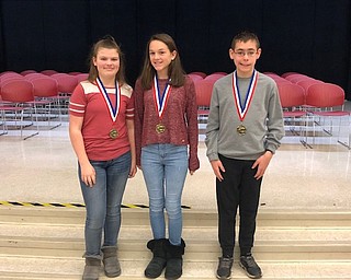 Neighbors | Submitted.Austintown Middle School Spelling Bee seventh-grade winners included, from left, Ciara Stewart in third place, Emily Beany in second place and Hunter Barnett in first place.
