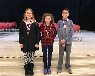 Neighbors | Submitted .Sixth-grade spelling bee winners were, from left, Alyana Christman in second place, Kelley Nemes in first place and Matt Smith in third place.