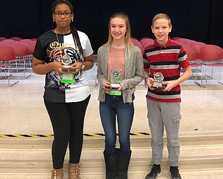 Neighbors | Submitted.The top three overall winners from the Austintown Middle School spelling bee were, from left, NyAsia Barnes, an eighth-grader who won second place; Hailey Piersant, an eighth-grader who won first place, and Trevor Porter, a seventh-grader who won third place.