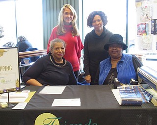 Neighbors | Jessica Harker.Representatives from the Friends of the Public Library provided gift wrapping for community members at the Boardman Barnes and Noble on Dec. 7. Friends members included, from left, (front) Wanda Smith, Bobbe Reynolds; (back) Development Director Deborah Liptak and Davida Perr-Taylor.