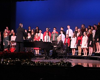 Neighbors | Abby Slanker.The Canfield Cambiata, comprised of seventh- and eighth-grade students under the direction of Tom Scurich, took the stage to perform on Dec. 4.