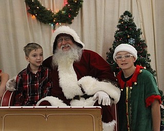 Neighbors | Abby Slanker.Boy Scout Jordan Jackson of Boardman told Santa what was on his wish list at the Boy Scout Camp Stambaugh of the Great Trail Council Boy Scouts of America Breakfast with Santa.