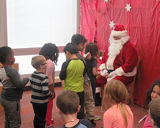 Neighbors | Jessica Harker.Santa visited classrooms at Austintown Elementary School to kick off the holiday season.