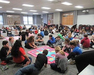 Neighbors | Jessica Harker .Fifth-grade students, paired up with their-sixth grade WEB leaders, joined together to create 40 tie blankets to donate to Akron Children's Hospital during the holiday season.