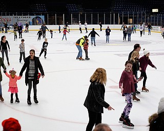 People ice skate in Covelli Centre during First Night Youngstown Monday night. EMILY MATTHEWS | THE VINDICATOR