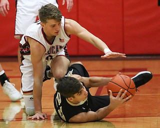 Carson Ryan (5) of Struthers defends Colton Maiorca (22) of Windham during Wednesday nights matchup at Struthers High School.  Dustin Livesay  |  The Vindicator  1/2/19  Struthers