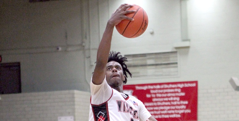Struthers’ Brandon Washington goes to the basket against Windham on Wednesday night at the Struthers Fieldhouse. Washington scored 24 points in a 69-37 victory.
