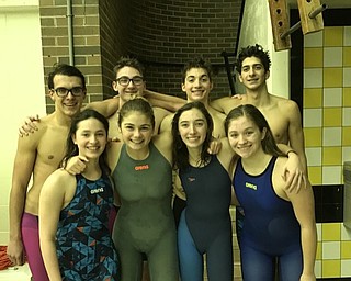 Neighbors | Submitted.Canfield swimmers competed at the tri-meet against Boardman and Massillon on Dec. 22. Swimmers pictured at the meet are (front) Miranda Peckman, Elle Dawson, Jordan Helmick, Sydney Schuler; (back) Jason Paris, Bobby Kutsch, James Dietz and Matthew Peckman.