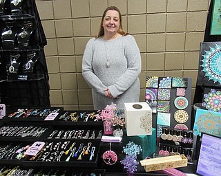 Neighbors | Jessica Harker.Suzanne Rich of Handcrafted by Suzanne sold her jewlery and her daughter Nichole's art on Dec. 14 inside the Stacey Pavillion at Austintown Park.