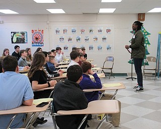 Neighbors | Jessica Harker.Orthodontist Dr. Moshood Martins spoke to students Dec. 14 at Poland Middle School's annual Career Day.