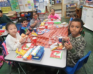Neighbors | Jessica Harker.Kindergarten students at Boardman Robinwood Lane elementary celebrated the holiday season with a party, including pizza and candy canes provided by the school's PTA.