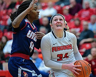 YOUNGSTOWN, OHIO - JANUARY 3, 2018: Youngstown State's McKenah Peters goes to the basket against Illinois-Chicago's Jasmine Gaines during the first half of their game, Thursday night Beeghley Center. Youngstown State won 81-29. DAVID DERMER | THE VINDICATOR