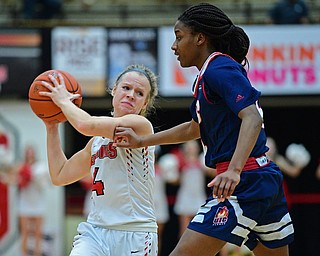 YOUNGSTOWN, OHIO - JANUARY 3, 2018: Youngstown State's Melinda Trimmer puts a move on to avoid Illinois-Chicago's Jasmine Gaines during the first half of their game, Thursday night Beeghley Center. Youngstown State won 81-29. DAVID DERMER | THE VINDICATOR