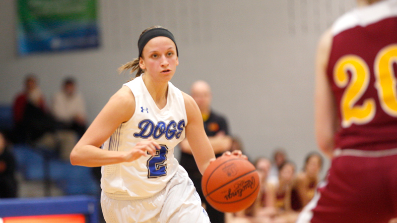 Poland’s Sarah Bury brings the ball up the court against Cardinal Mooney on Thursday night. Bury scored 20 points and reached 1,000 points for her career in the Bulldogs’ 67-43 win.