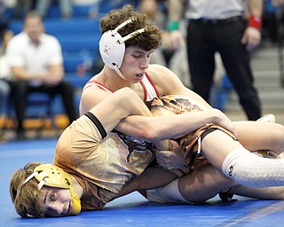 South Range's Michael Markulin, top, and Pymatuning Valley's Jake Edelman wrestle during the Jackson-Milton Invitational finals on Saturday. EMILY MATTHEWS | THE VINDICATOR