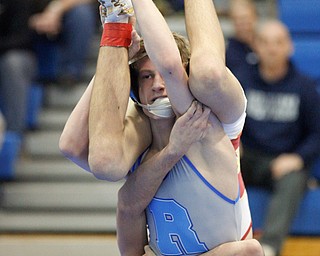 Rootsown's Mason Kline wrestles South Range's Kyle Keenan during the Jackson-Milton Invitational finals on Saturday. EMILY MATTHEWS | THE VINDICATOR