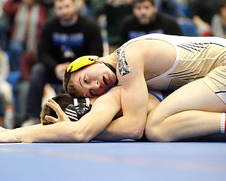 Crestview's Isaac Ricketts tries to pin down Jackson Milton's Anthony Pizzuto during the Jackson-Milton Invitational finals on Saturday. EMILY MATTHEWS | THE VINDICATOR