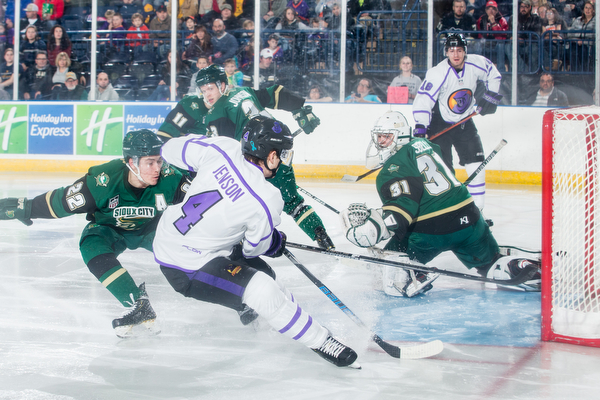 Scott R. Galvin | The Vindicator.Youngstown Phantoms defenseman Nikolai Jenson (4) scores a goal against Sioux City Musketeers goalie Jake Sibell (31) during the first period at the Covelli Centre on Saturday, January 5, 2019.