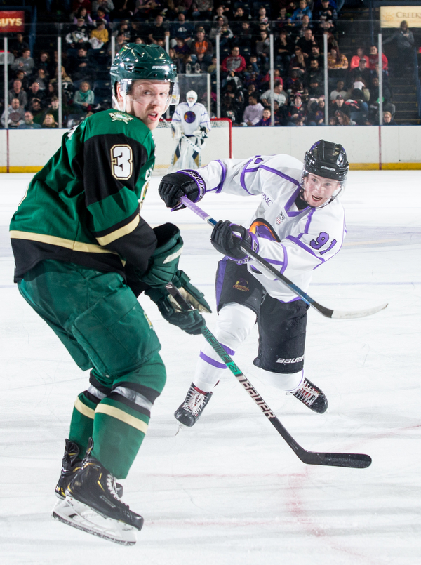 Scott R. Galvin | The Vindicator.Youngstown Phantoms forward Connor MacEachern (91) makes a shot for a goal during the first period past Sioux City Musketeers defenseman Luke Johnson (3) doing the second period at the Covelli Centre on Saturday, January 5, 2019.