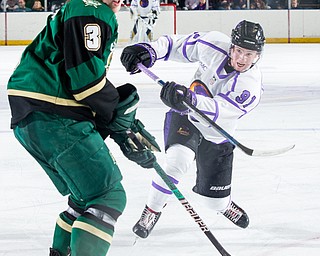 Scott R. Galvin | The Vindicator.Youngstown Phantoms forward Connor MacEachern (91) makes a shot for a goal during the first period past Sioux City Musketeers defenseman Luke Johnson (3) doing the second period at the Covelli Centre on Saturday, January 5, 2019.