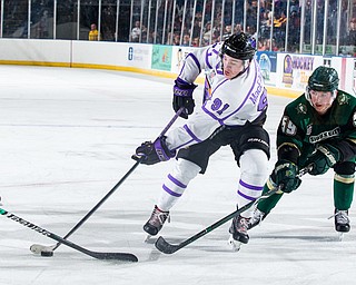 Scott R. Galvin | The Vindicator.Youngstown Phantoms forward Connor MacEachern (91) skates the puck past Sioux City Musketeers forward Ian Malcolmson (59) during the second period at the Covelli Centre on Saturday, January 5, 2019.